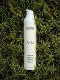 Ada Peptide Ageless AM/PM Cream 50 ml by Norla, cream airless pump bottle lying on green moss